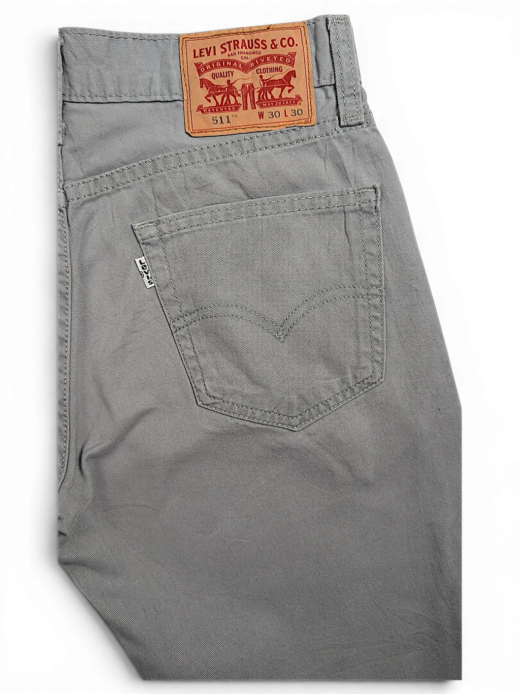 JAKE & IPI grey Levi's 511 chino pants featuring a leather brand patch and signature back pocket stitching
