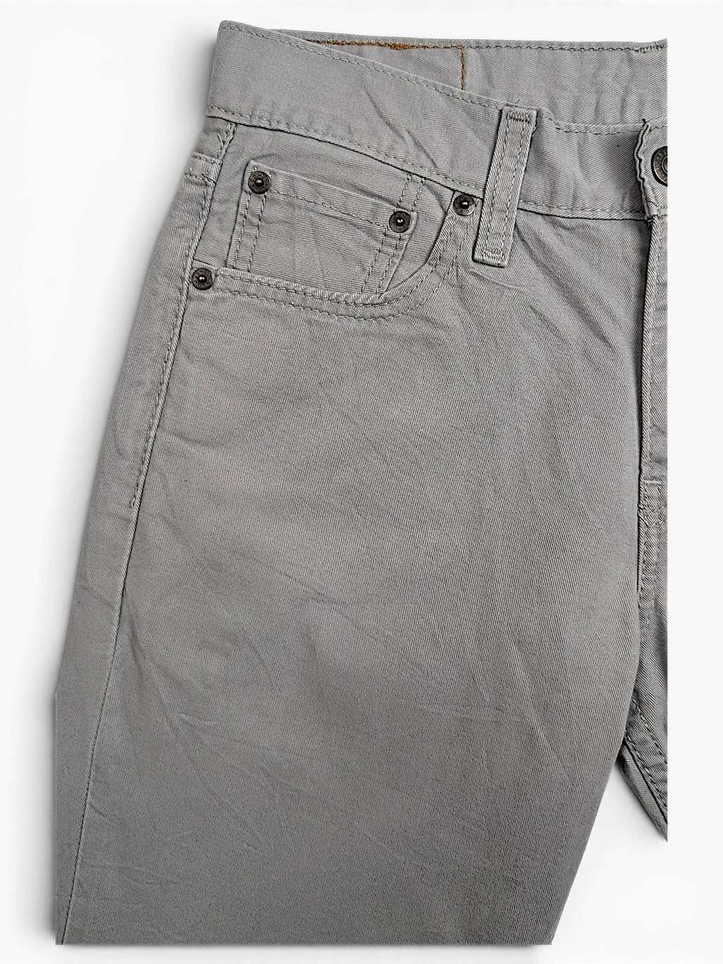 JAKE & IPI Levi's 511 grey chino pants featuring a classic five-pocket design with metal rivets and durable fabric.