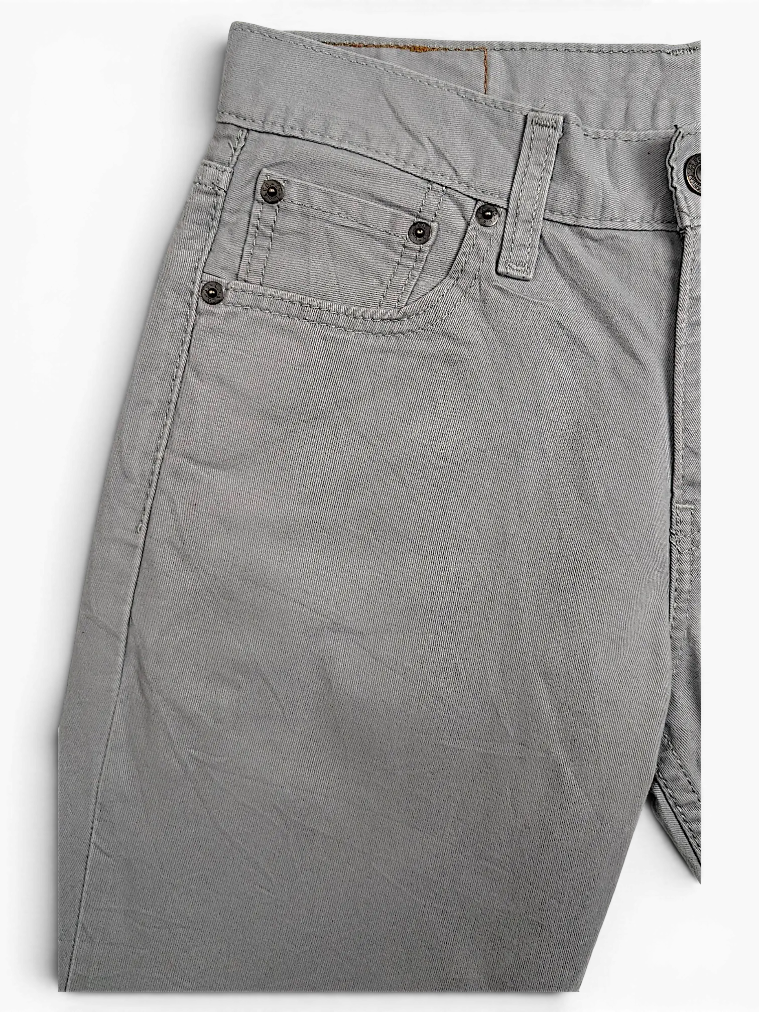 JAKE & IPI Levi's 511 grey chino pants featuring a classic five-pocket design with metal rivets and durable fabric.