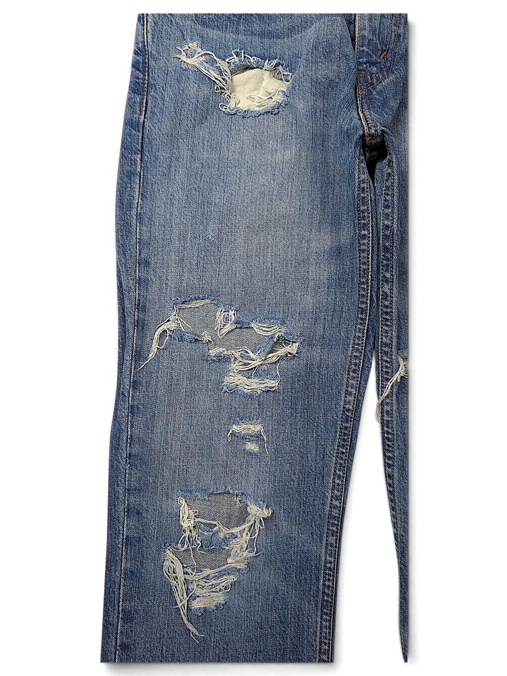 JAKE & IPI Levi's 511 slim fit blue denim jeans featuring distressed ripped details and frayed knee holes.