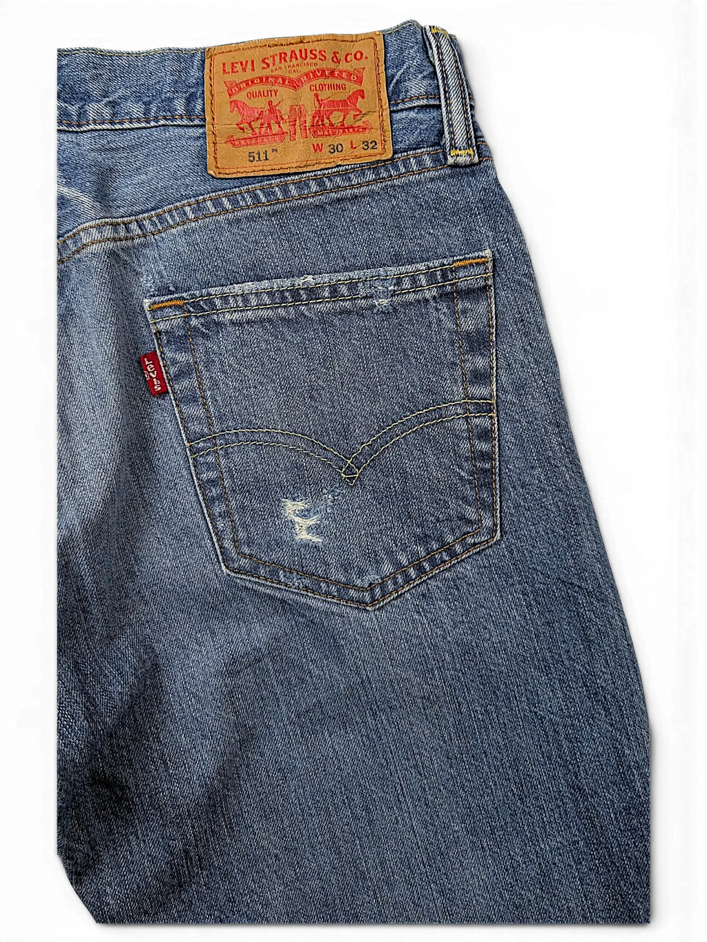 JAKE & IPI Levi's 511 slim fit blue denim jeans with back pocket distressing and leather brand patch