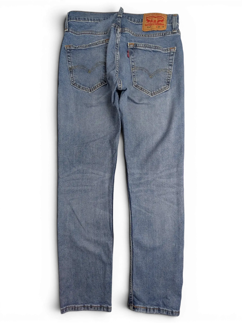 JAKE & IPI Levi's 514 straight leg blue denim jeans with back pockets and leather brand patch on waist