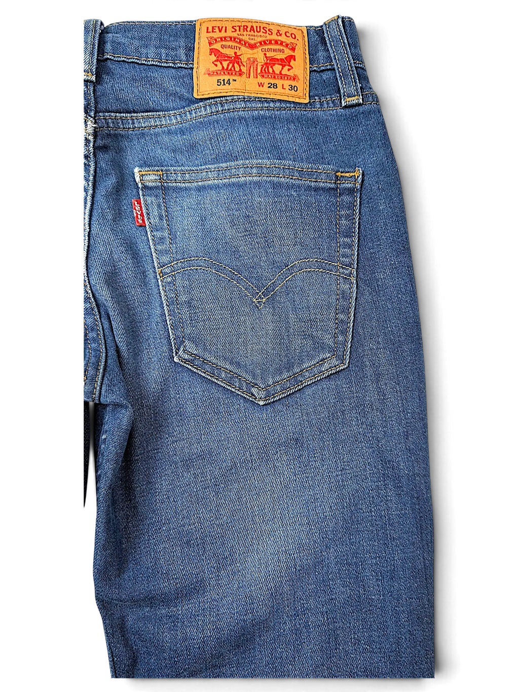 JAKE & IPI Levi's 514 blue denim jeans featuring a back pocket with signature stitching and a leather waist patch.