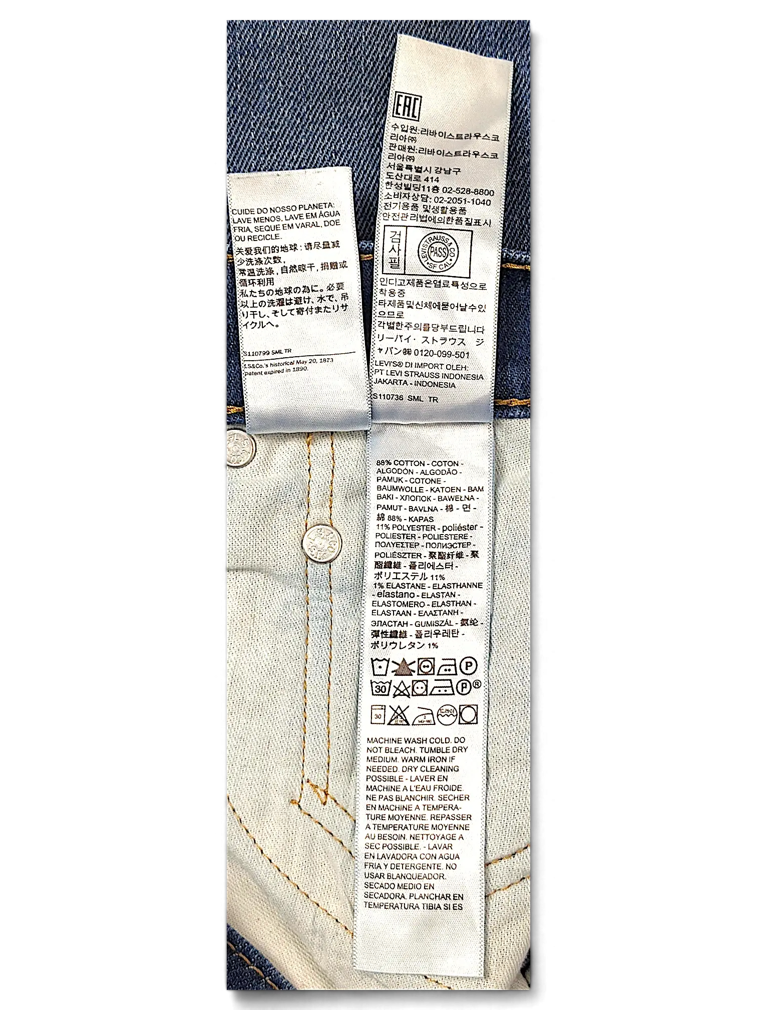 JAKE & IPI Levi's 514 jeans interior care and material composition label showing cotton and elastane blend