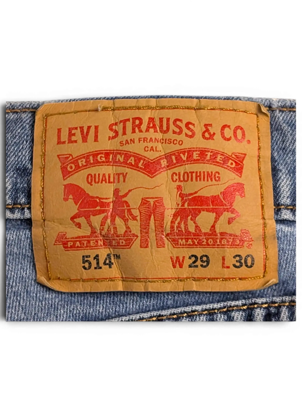 JAKE & IPI Levi's 514 blue denim jeans with leather back waist patch showing size W29 L30