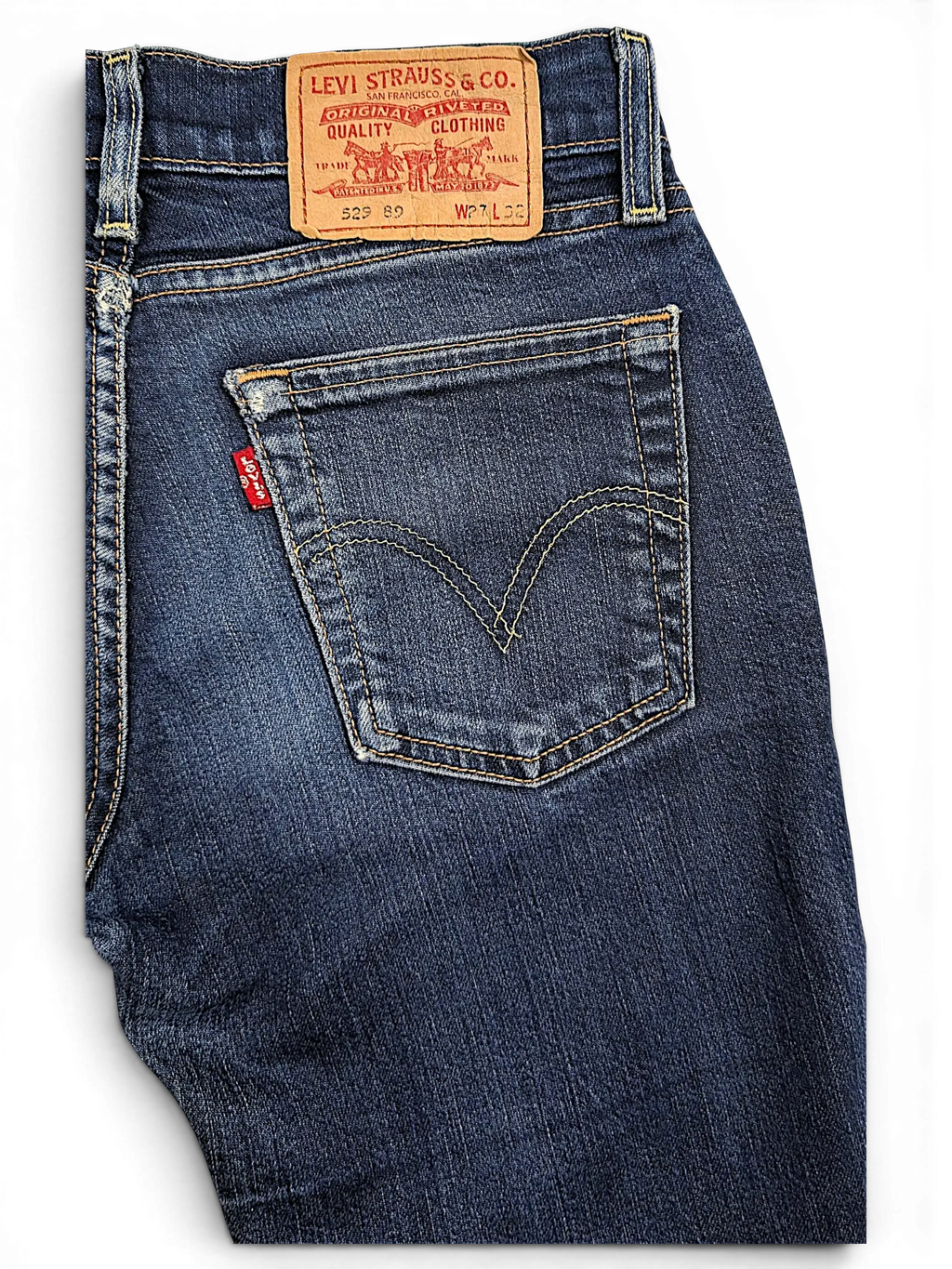 JAKE & IPI Levi's 529 89 bootcut jeans in dark blue denim with a leather back patch and classic red tab detail.