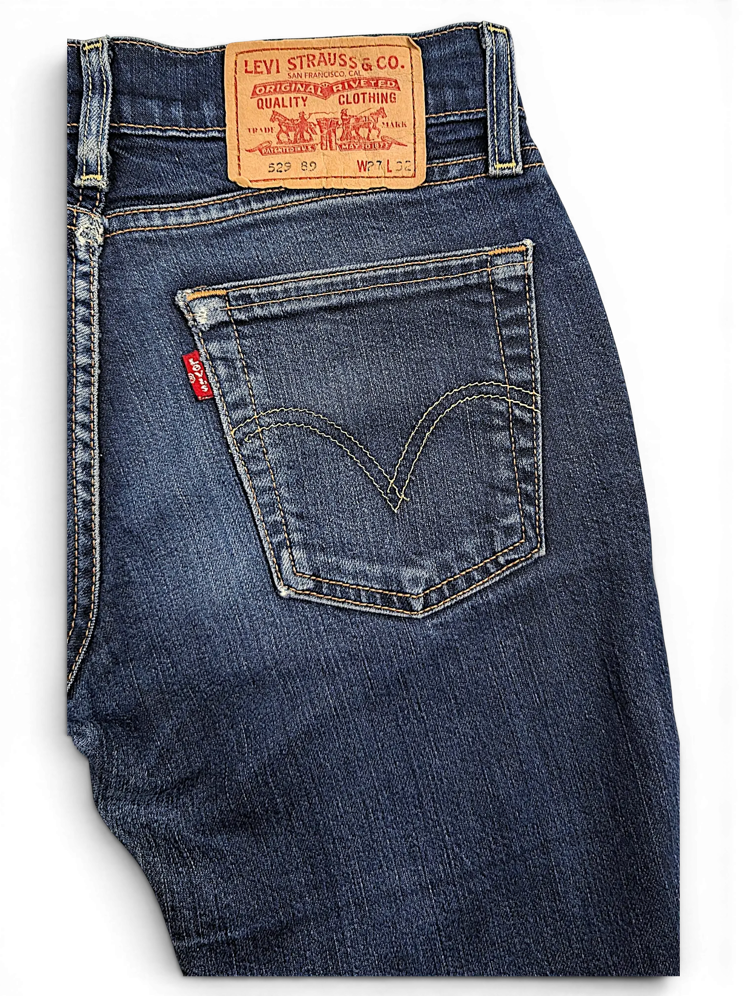 JAKE & IPI Levi's 529 89 bootcut jeans in dark blue denim with a leather back patch and classic red tab detail.