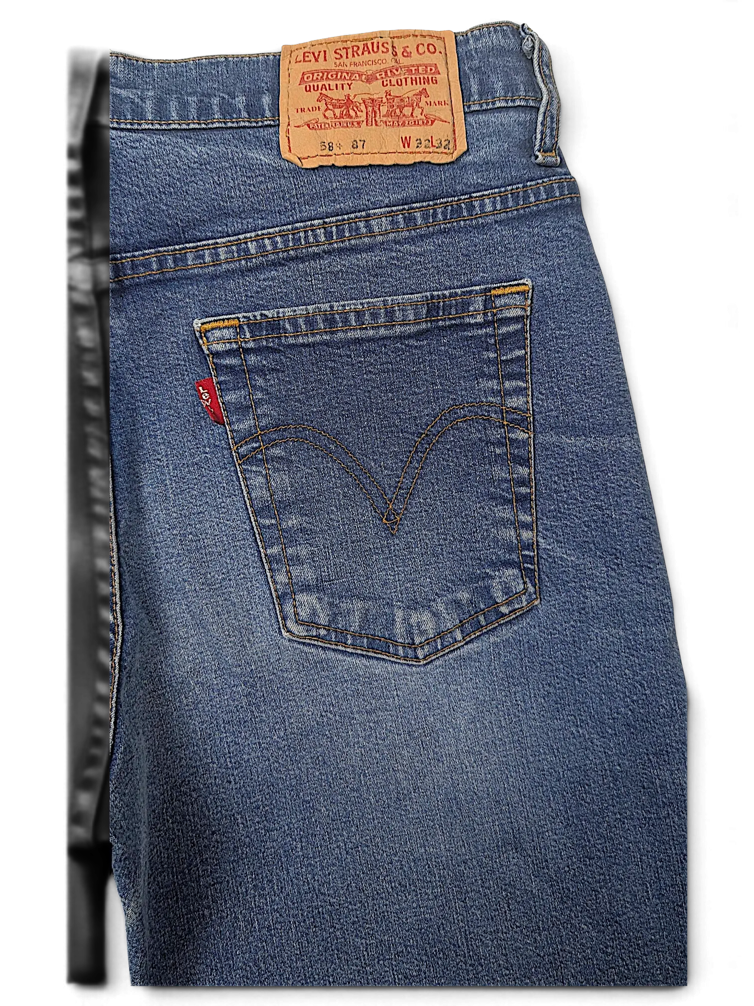 JAKE & IPI Levi's 584 87 blue denim jeans featuring a classic back pocket with red tab and leather brand patch.