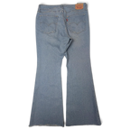 JAKE & IPI Levi's 726 vaaleat flare-farkut takaa: viisitaskurakenne ja rispaantunut helma.