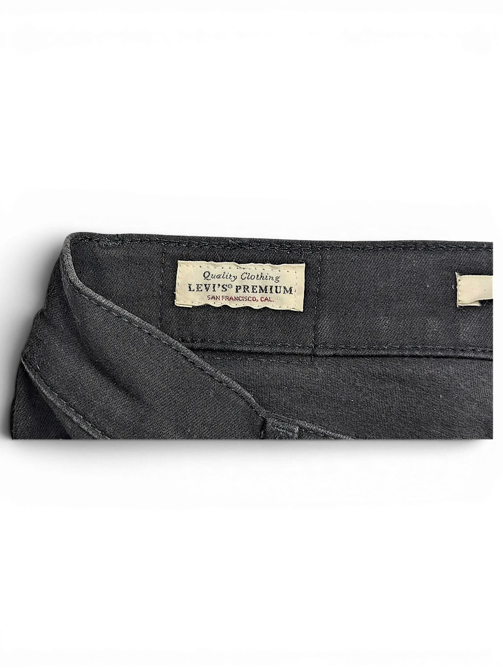 JAKE & IPI Levi's 710 Super Skinny black denim jeans featuring the interior Levi's Premium quality clothing label.