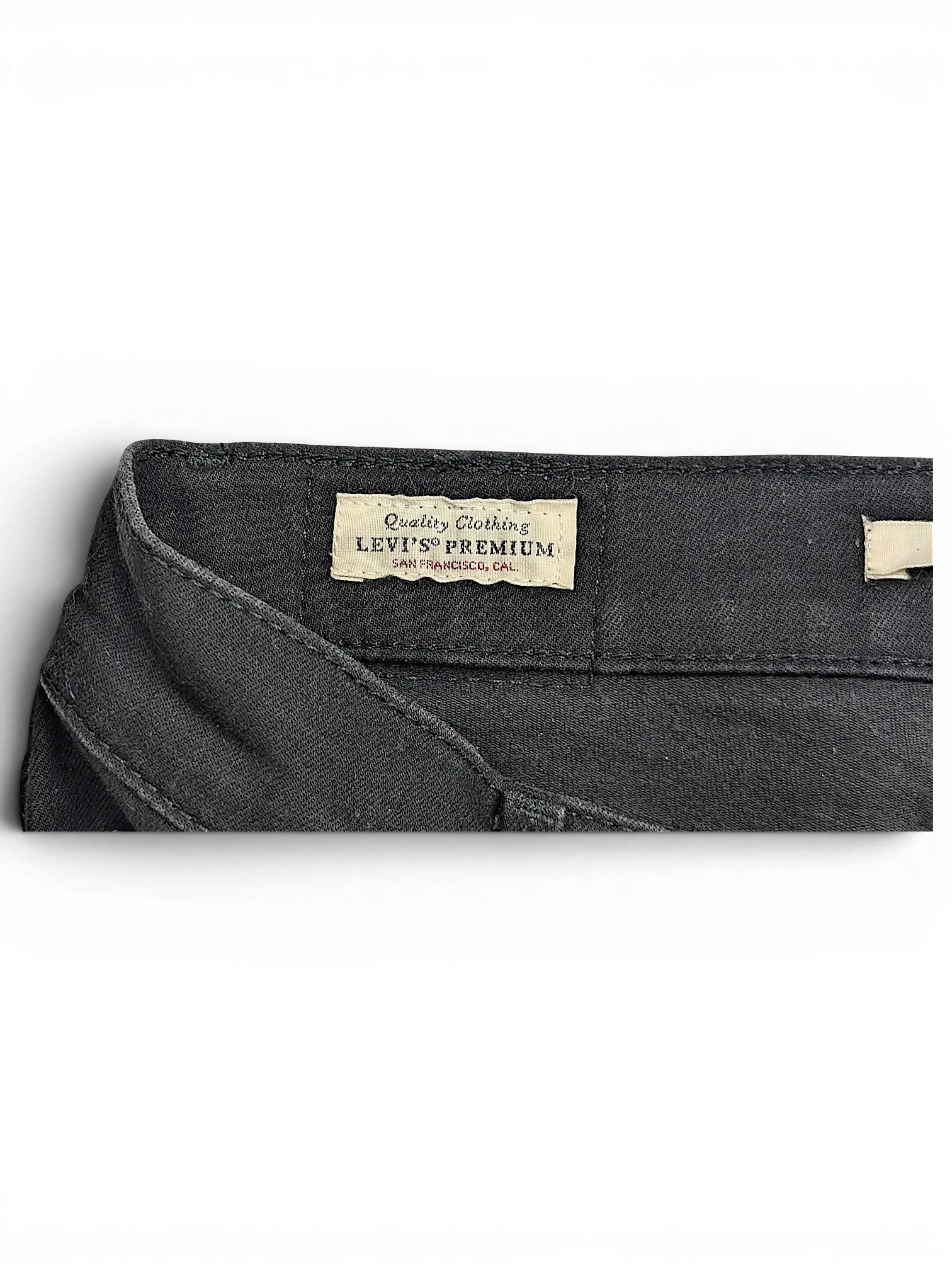 JAKE & IPI Levi's 710 Super Skinny black denim jeans featuring the interior Levi's Premium quality clothing label.