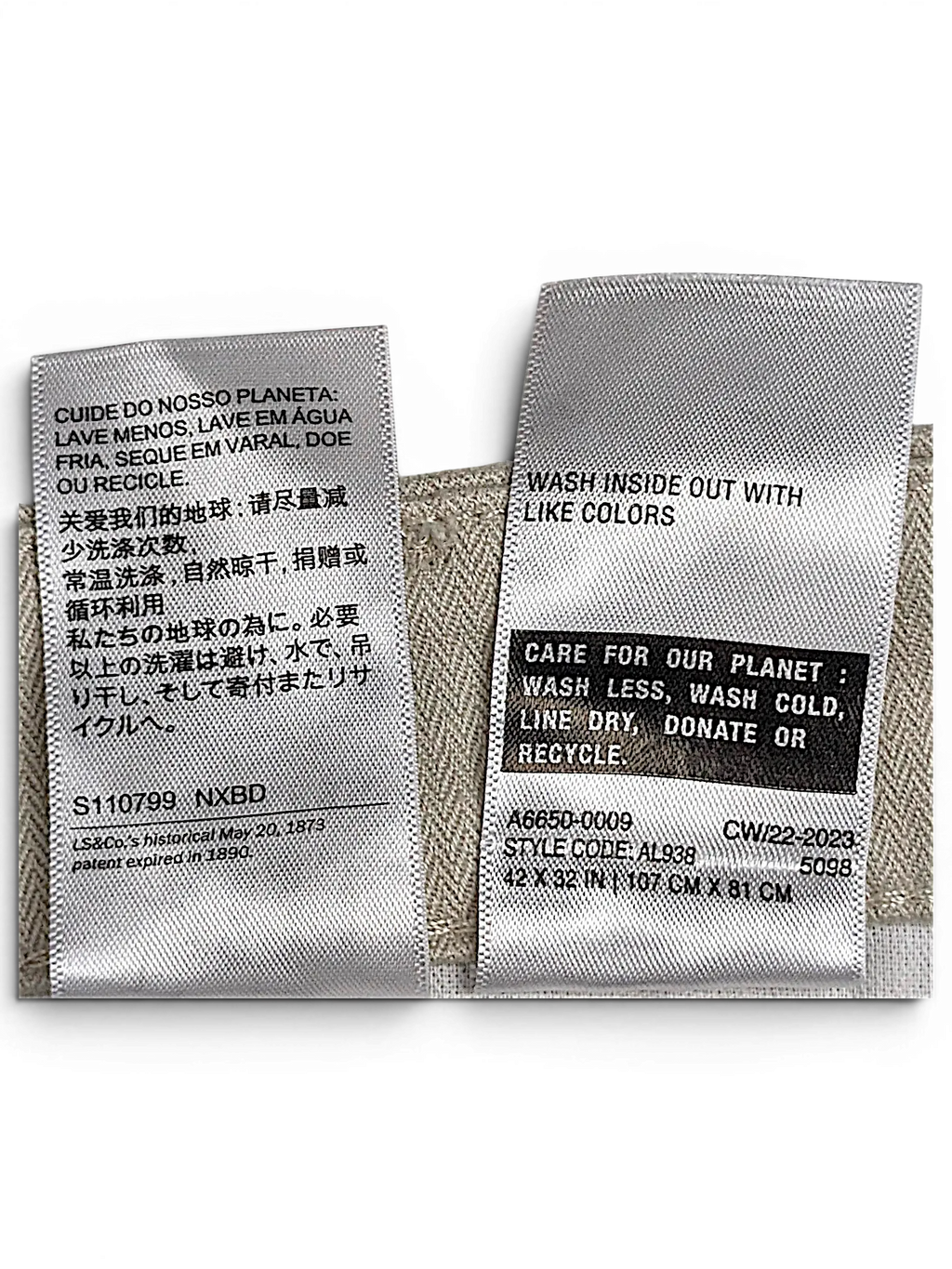 JAKE & IPI Levi's XX Chino 511 care labels showing washing instructions in multiple languages on beige fabric