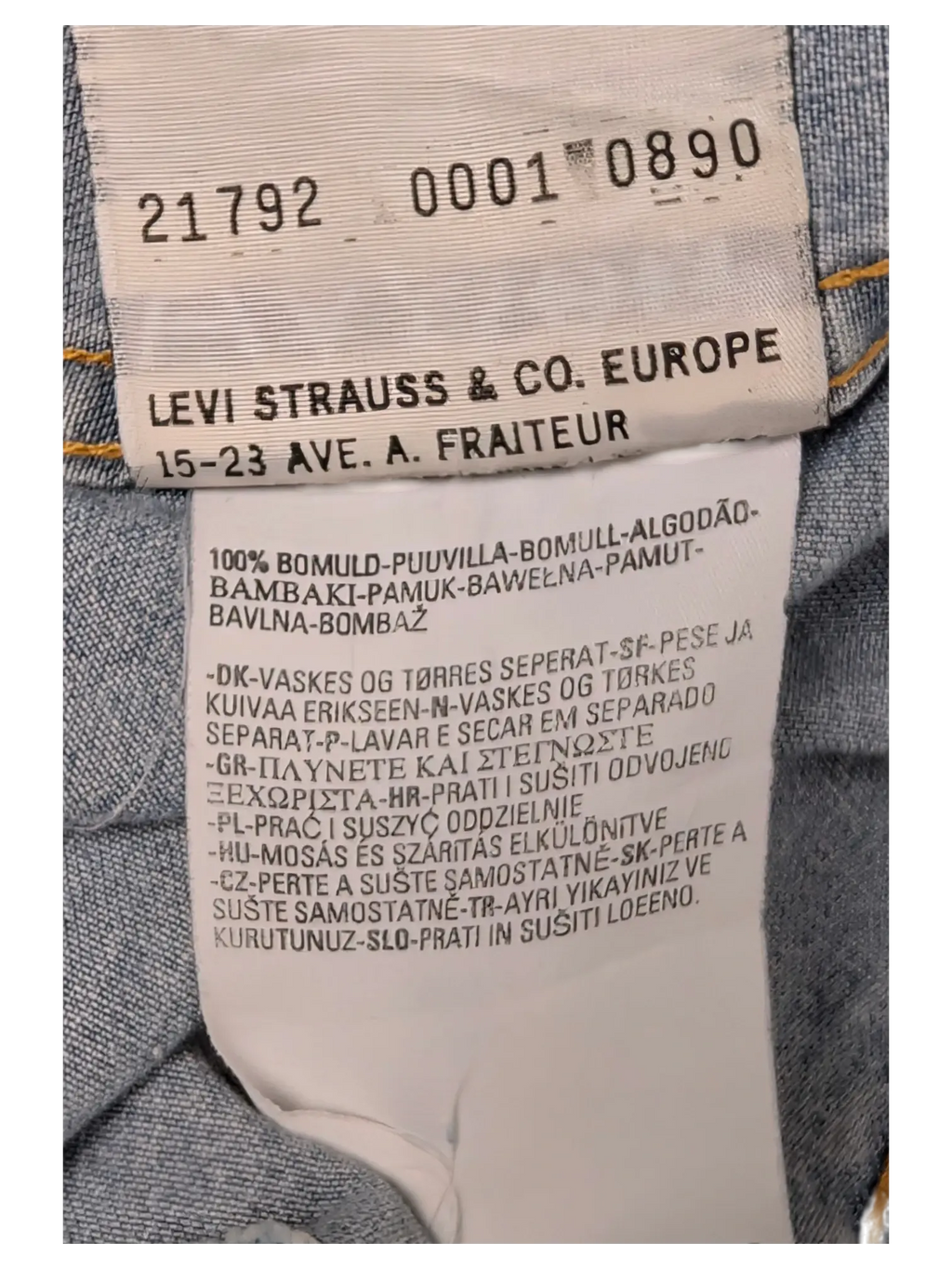 JAKE & IPI Levi's denim shirt care label with fabric composition and washing instructions in multiple languages