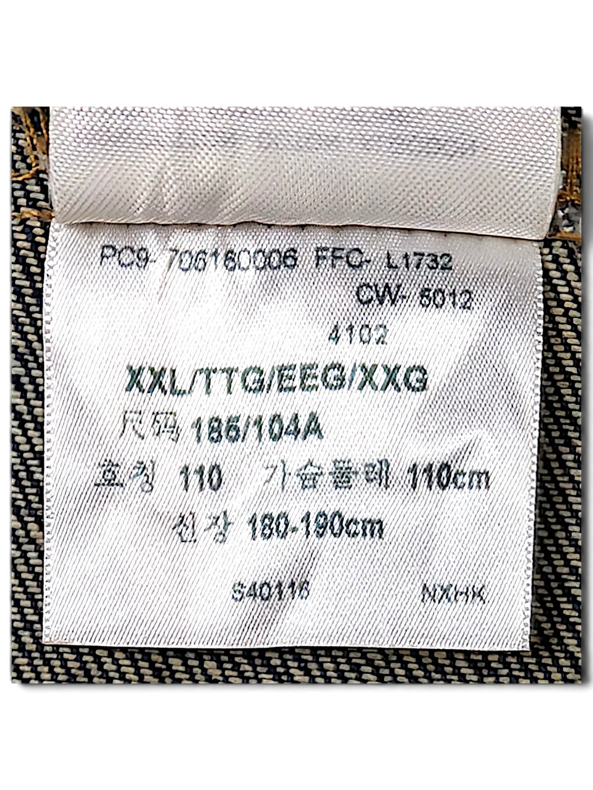 JAKE & IPI Levi's denim vest interior care and size label showing XXL sizing and garment care instructions