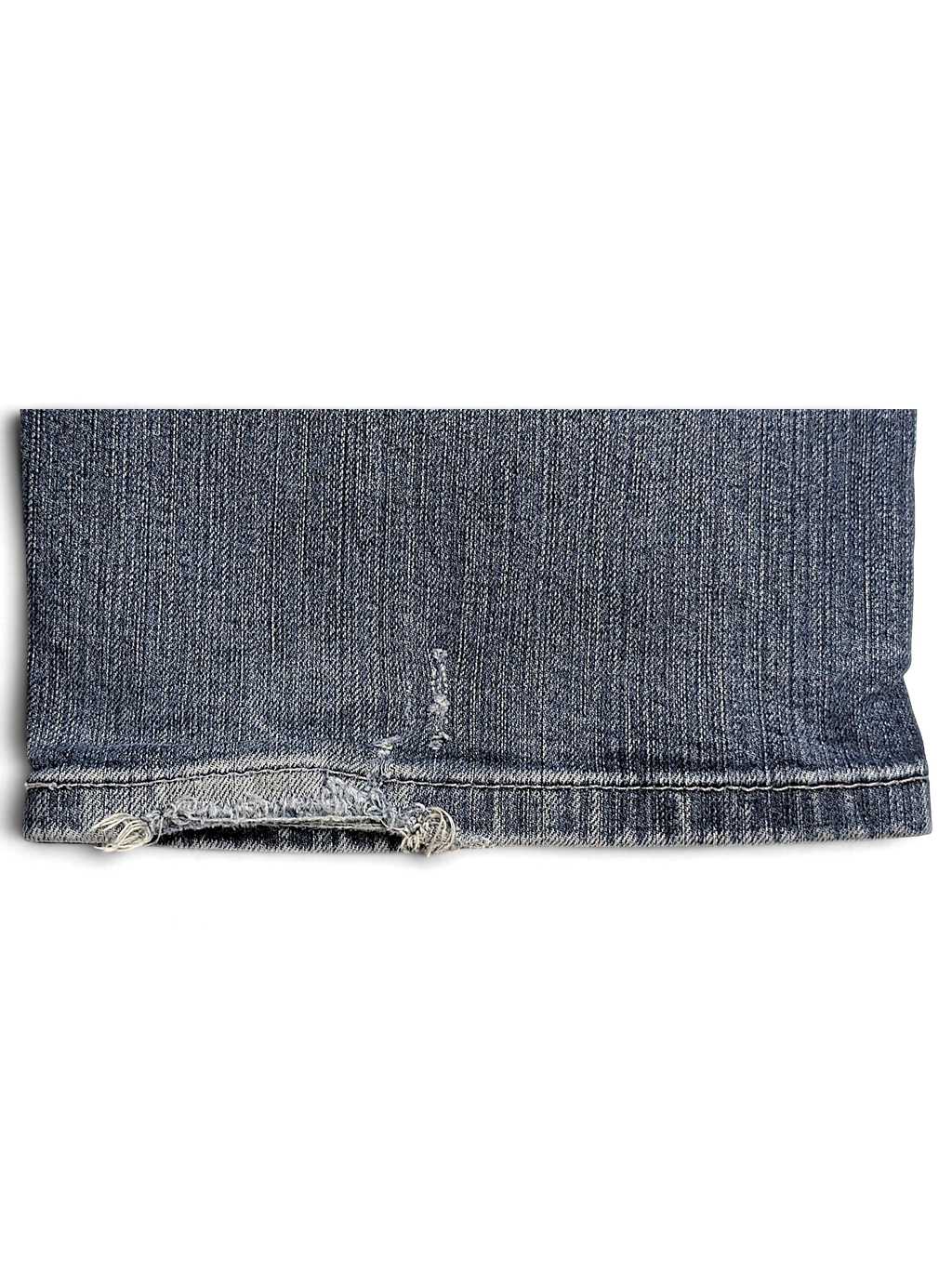 JAKE & IPI Levi’s 505 faded blue stretch denim jeans featuring a distressed frayed hem detail.