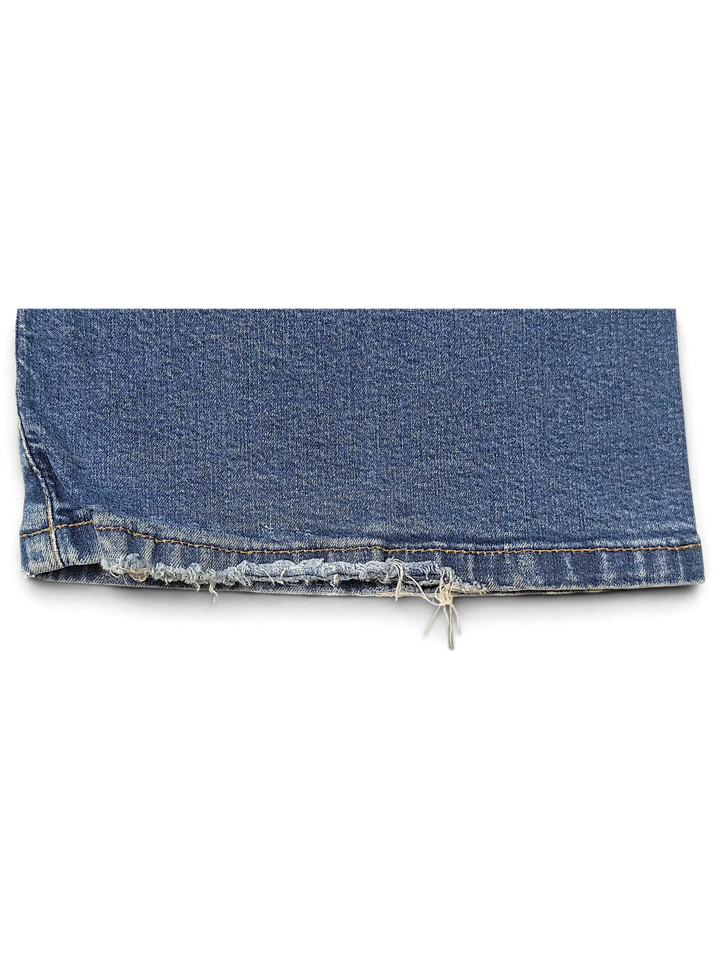 JAKE & IPI Levi's 584 blue denim jeans featuring a distressed frayed hem detail on the leg opening