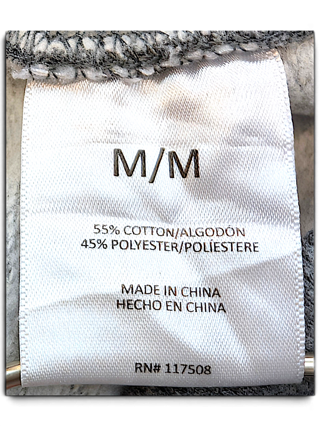 JAKE & IPI Levi's hoodie size M label showing 55 percent cotton and 45 percent polyester blend fabric composition