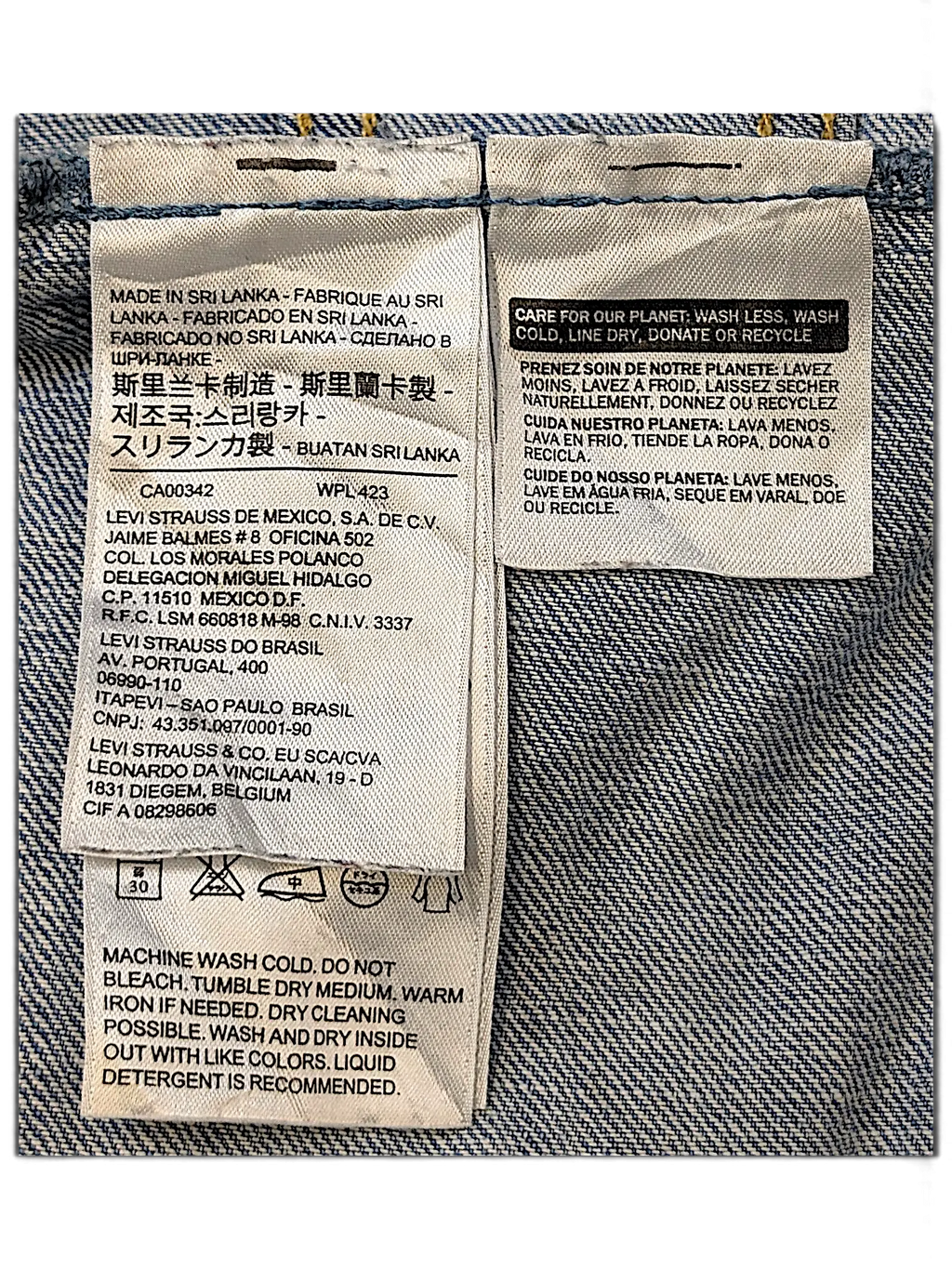 JAKE & IPI Levi's Strauss girls jacket care and origin label showing washing instructions and manufacturing details