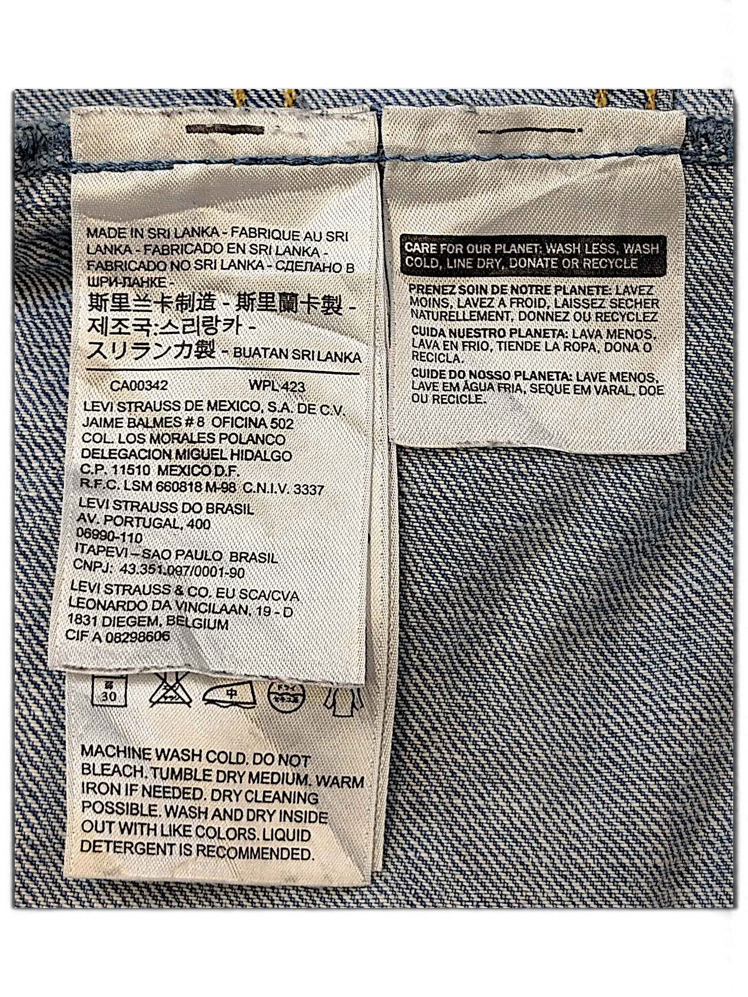 JAKE & IPI Levi's Strauss girls jacket care and origin label showing washing instructions and manufacturing details
