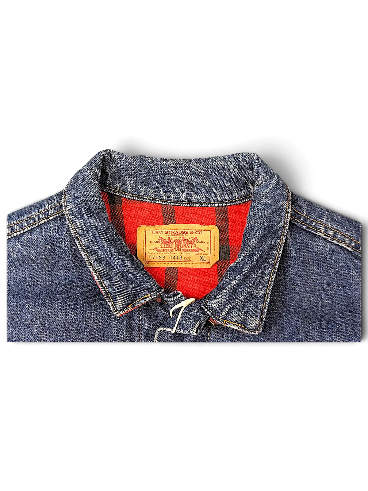 JAKE & IPI Levi's denim jacket with a red and black plaid quilted lining and leather brand patch at the collar