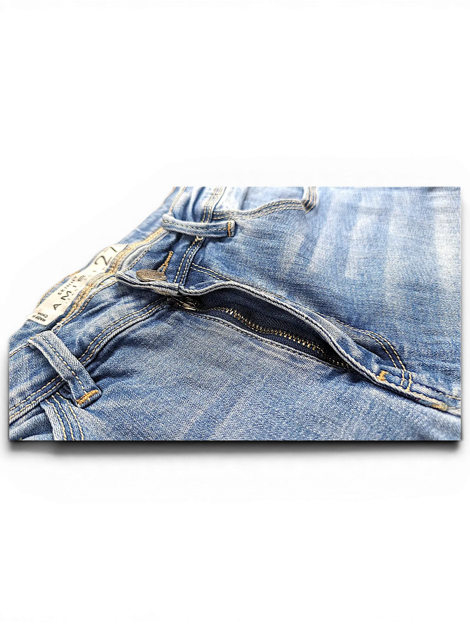 JAKE & IPI Amisu skinny jeans in light blue denim with a zip fly and belt loops