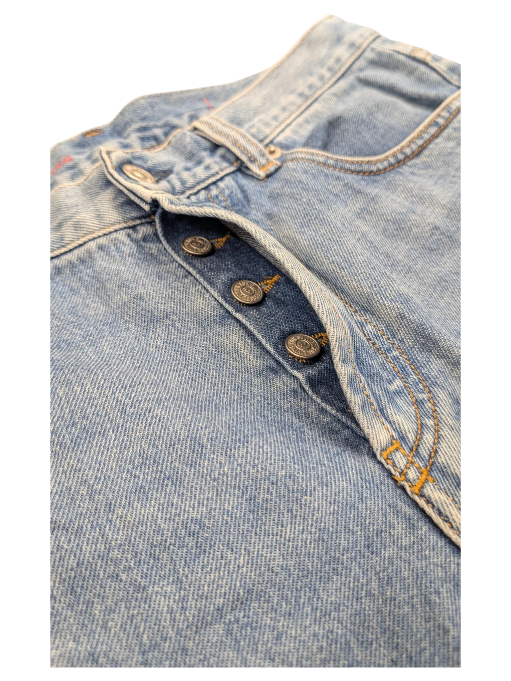 JAKE & IPI light wash denim jeans with button fly and copper-toned buttons. Classic 5-pocket style.