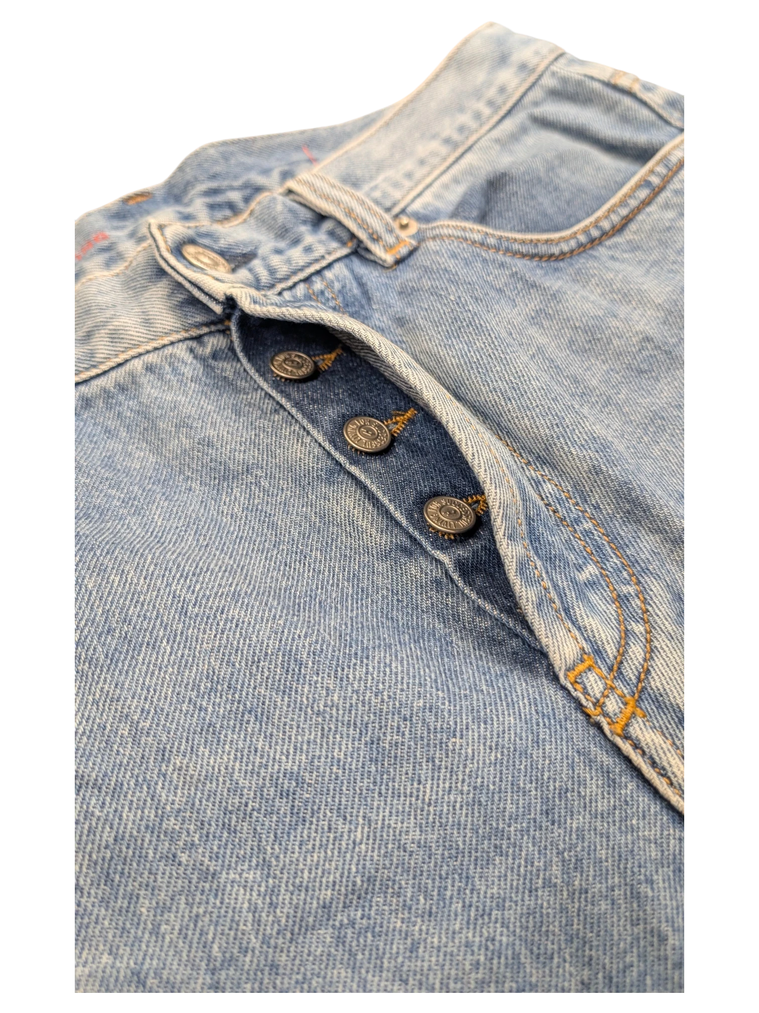 JAKE & IPI light wash denim jeans with button fly and copper-toned buttons. Classic 5-pocket style.