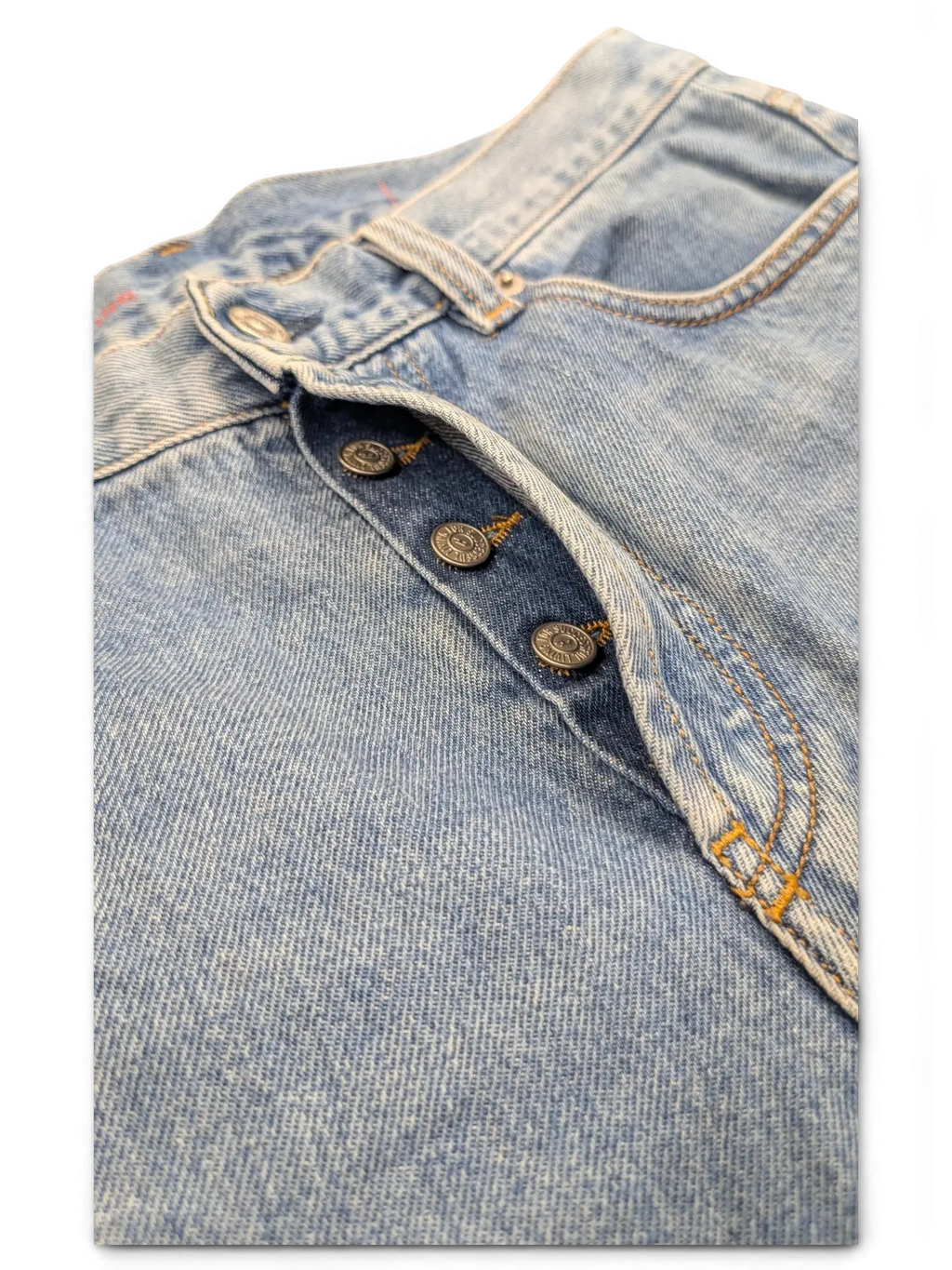 JAKE & IPI light wash denim jeans with button fly and copper-toned buttons. Classic 5-pocket style.