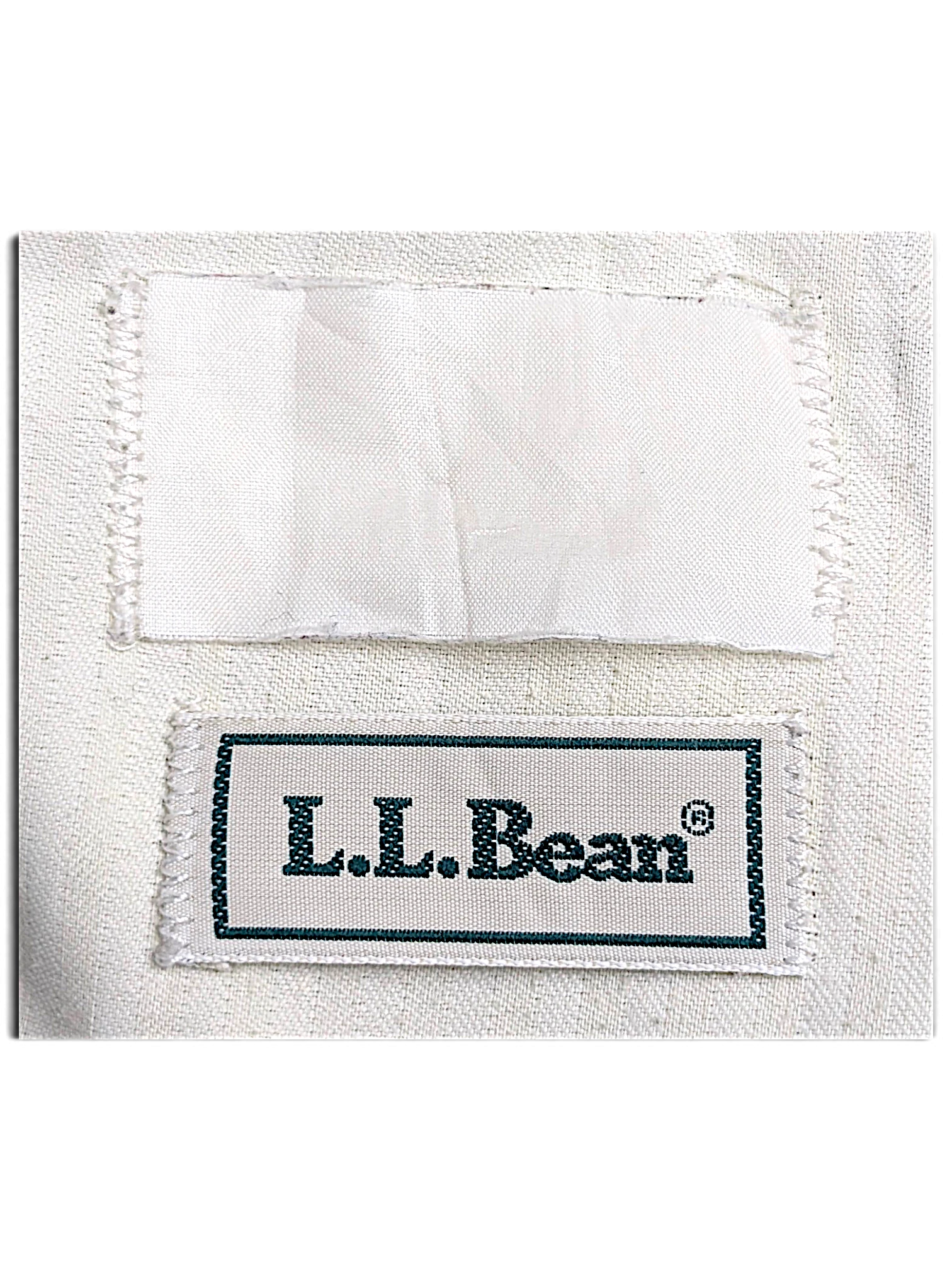 JAKE & IPI L.L.Bean brand label stitched on beige cotton fabric of pre-owned pleated chinos