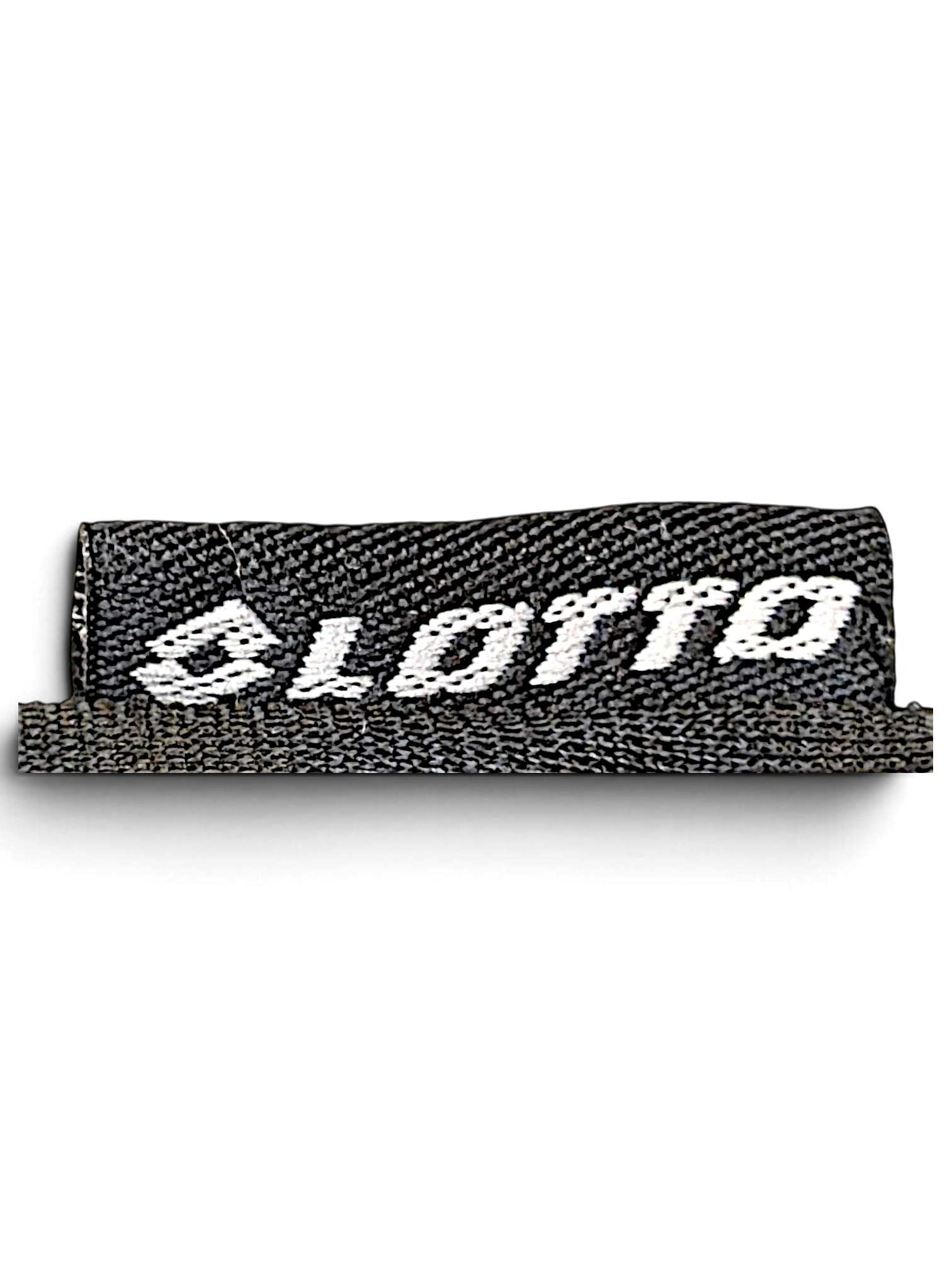 JAKE & IPI black Lotto brand clothing label with white embroidered logo text