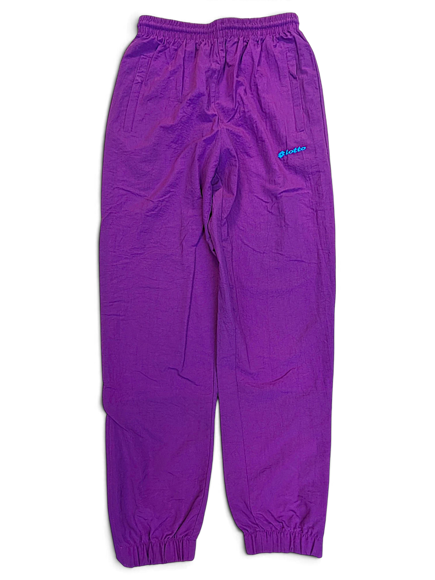 JAKE & IPI pre-owned purple Lotto track pants with elasticated waistband and cuffs in size small.