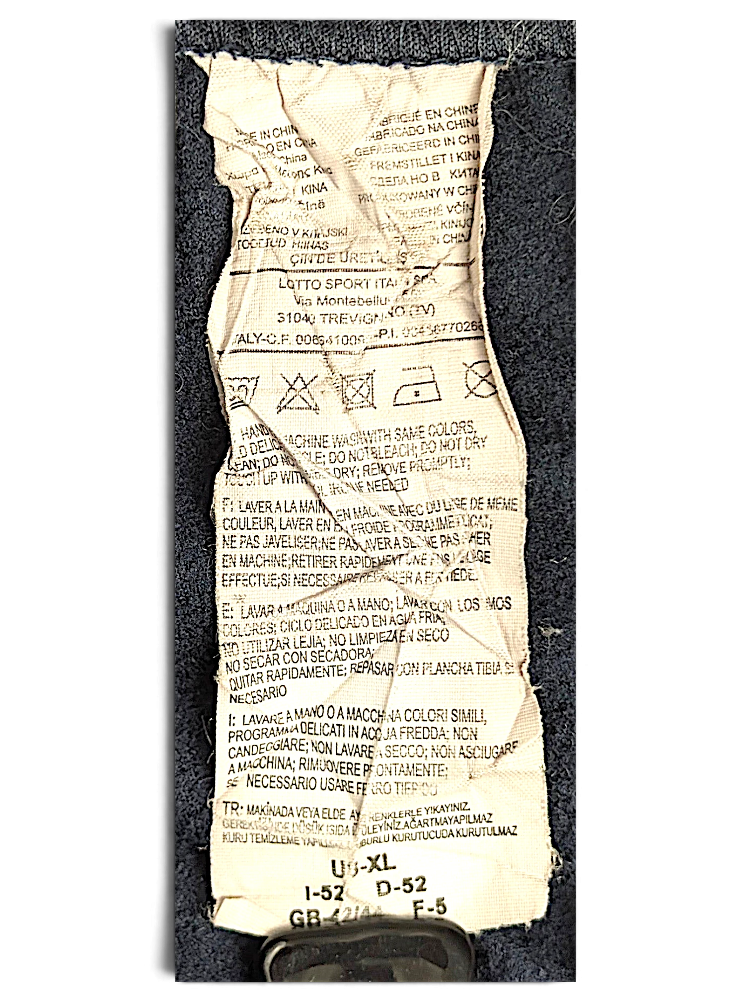 JAKE & IPI Lotto navy blue track pants care label showing size XL and polyester composition details