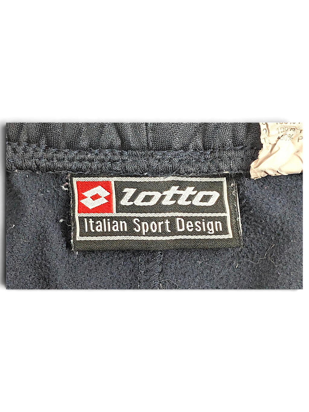 JAKE & IPI Lotto navy blue track pants interior brand label with Italian Sport Design text