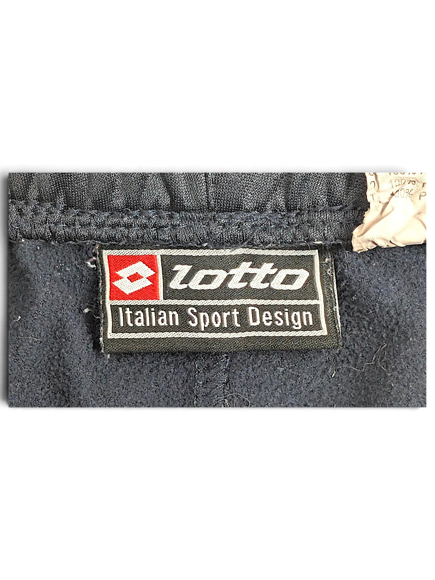 JAKE & IPI Lotto navy blue track pants interior brand label with Italian Sport Design text