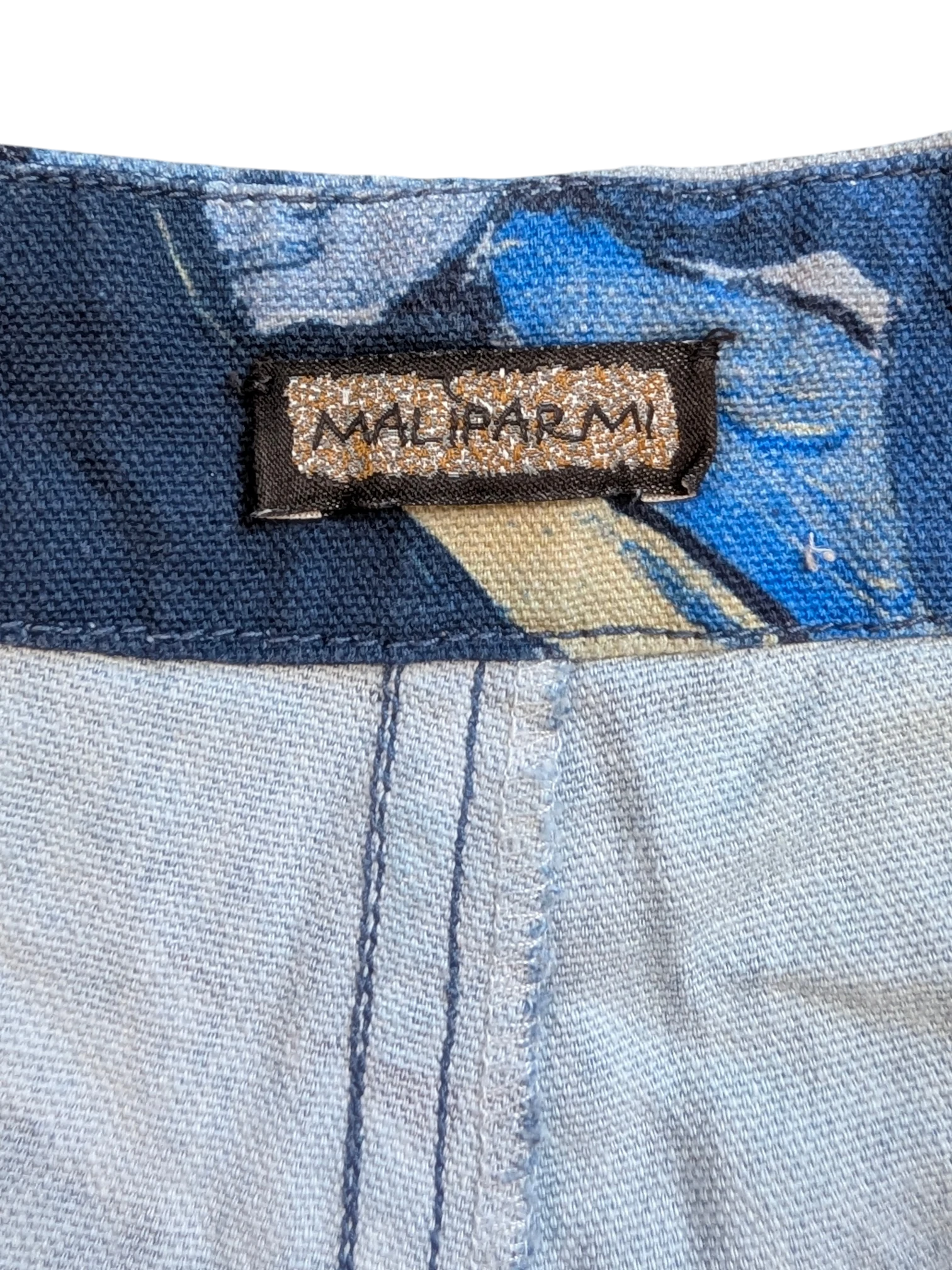JAKE & IPI Maliparmi blue abstract print cargo pants with a size 40 tag.