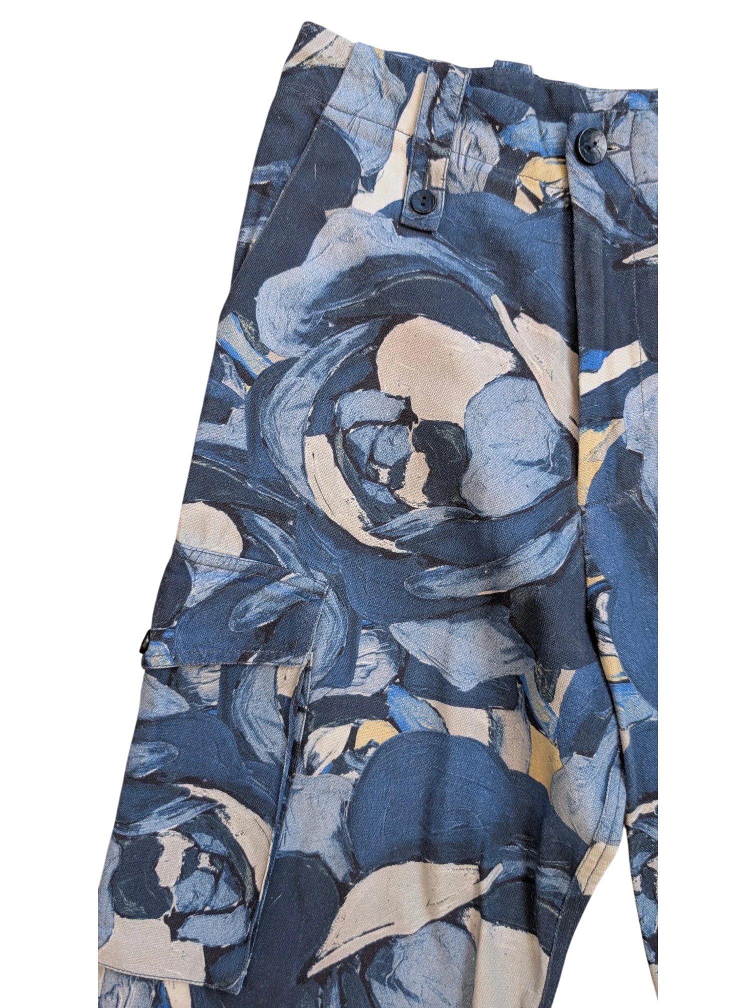 JAKE & IPI Maliparmi blue floral print cargo pants with button closure and flap pockets.