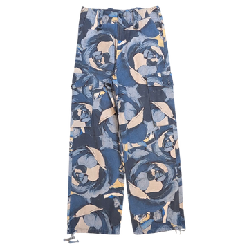 JAKE & IPI Maliparmi blue floral print cargo pants with drawstring ankles and button flap pockets.