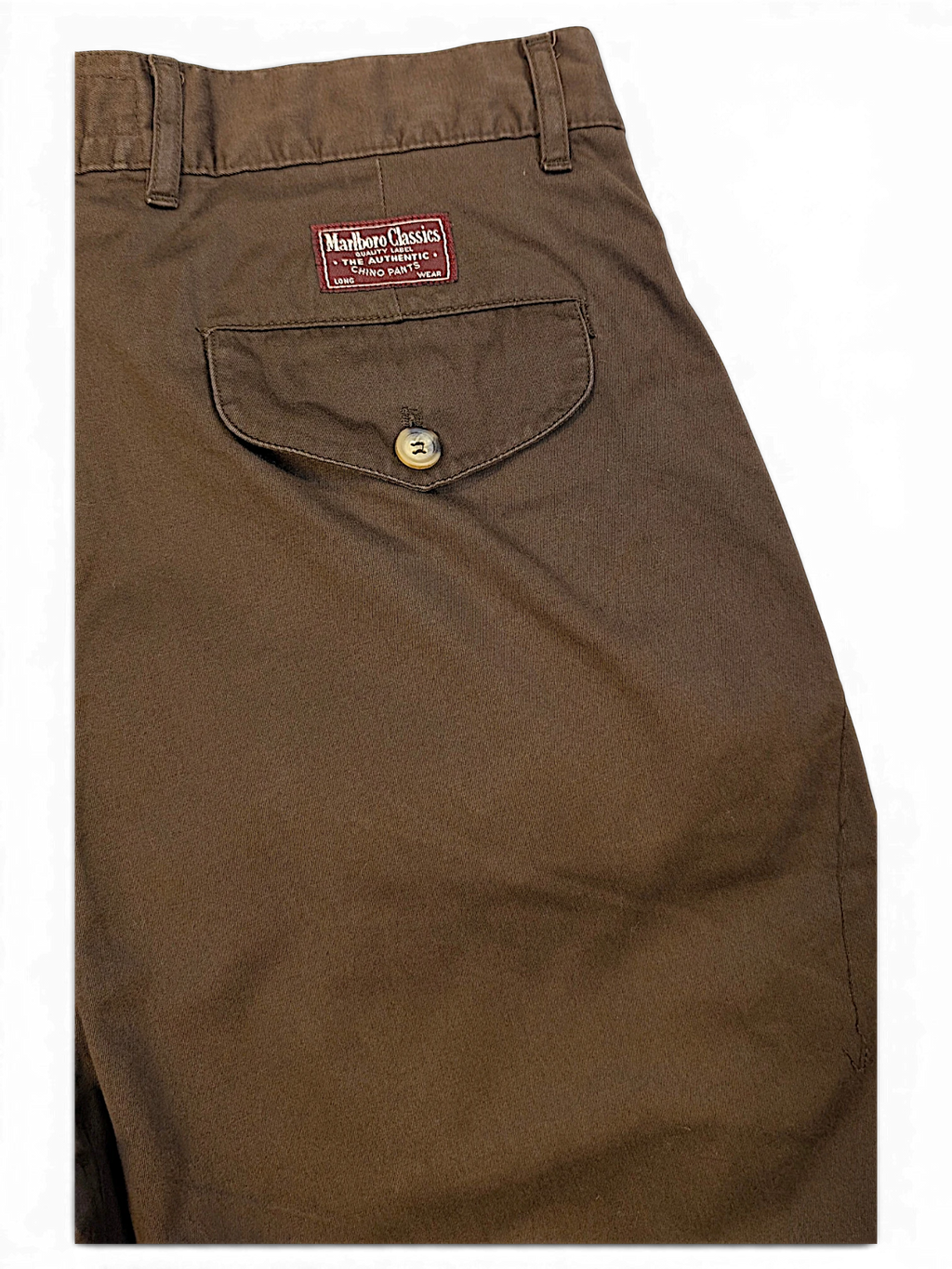 JAKE & IPI Marlboro Classics brown cotton chino trousers featuring a rear buttoned pocket and branded patch.