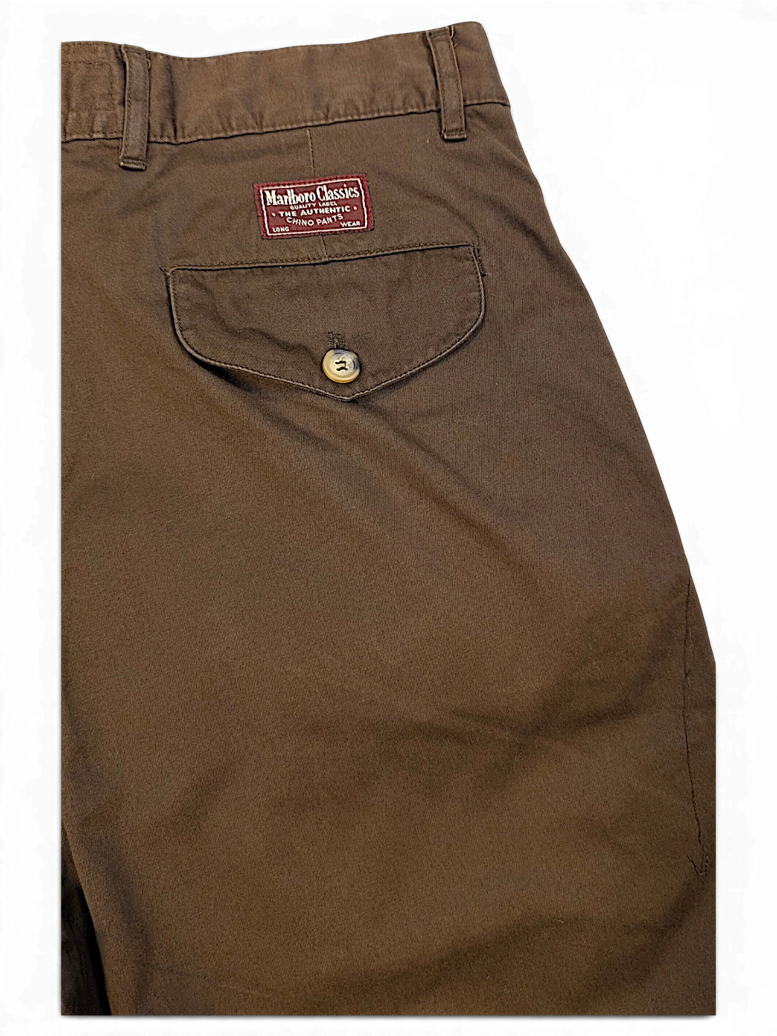 JAKE & IPI Marlboro Classics brown cotton chino trousers featuring a rear buttoned pocket and branded patch.