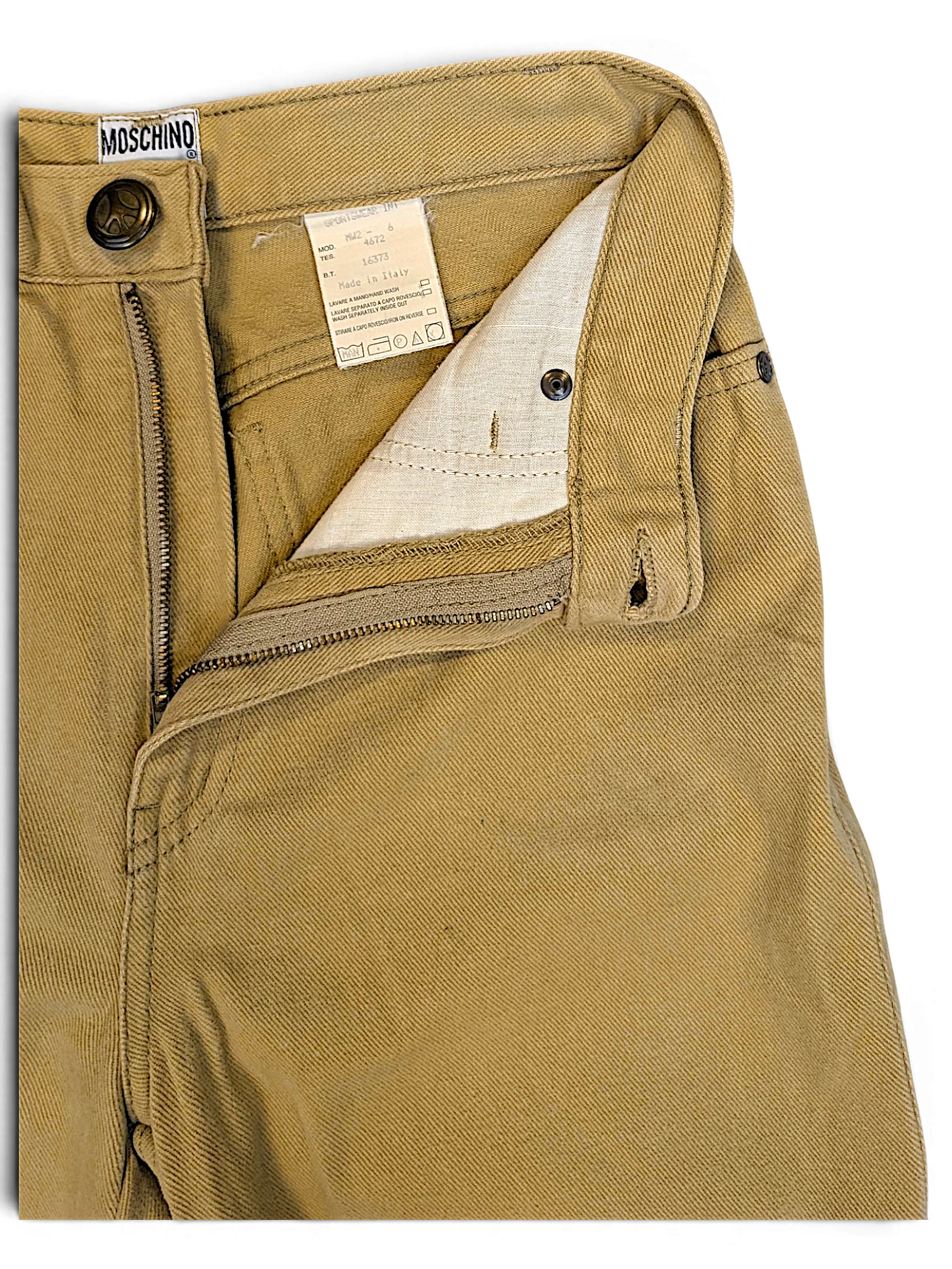 JAKE & IPI pre-owned Moschino Jeans beige trousers showing the interior label, button fly, and durable fabric texture.