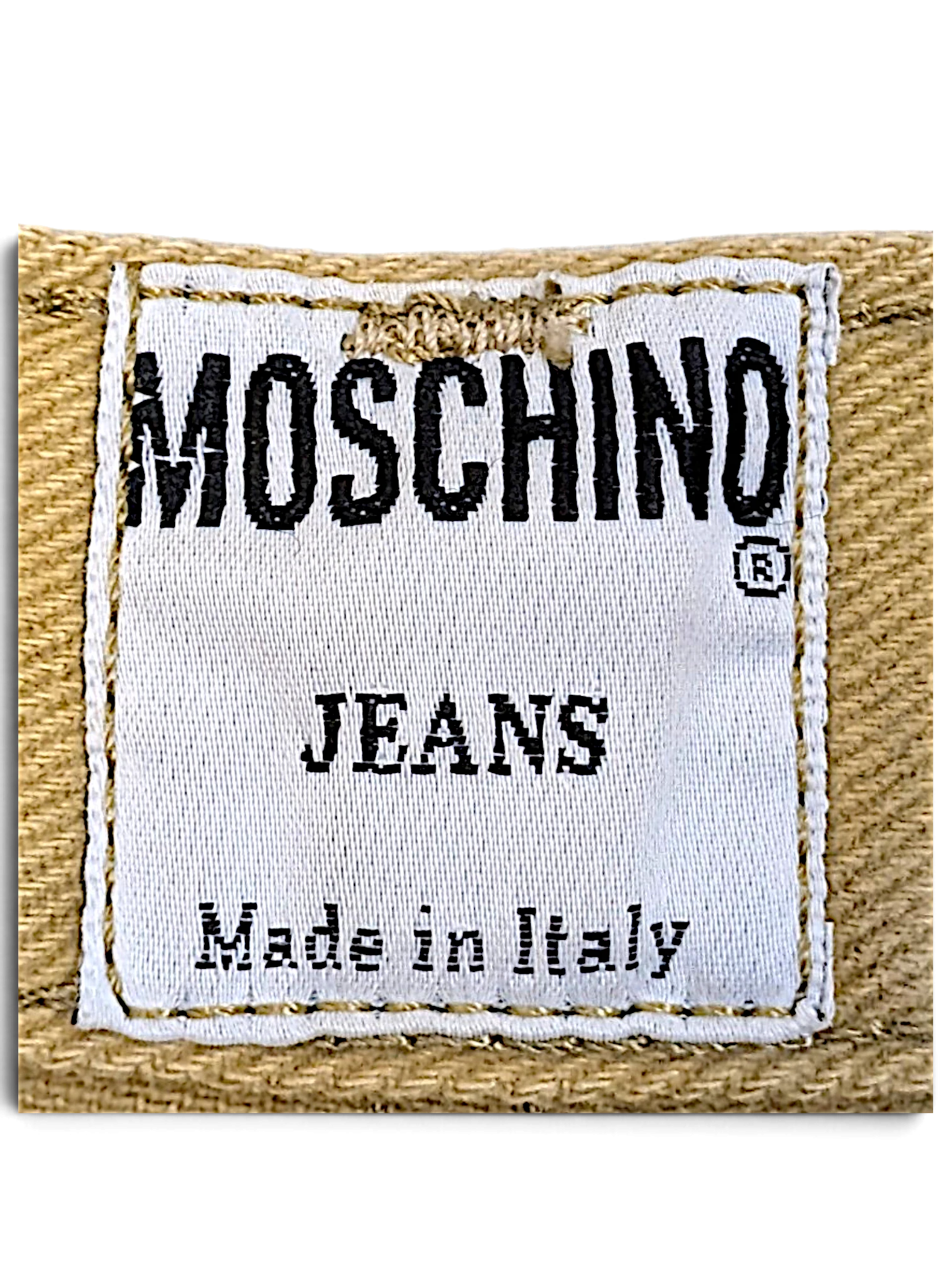 JAKE & IPI Moschino Jeans brand label stitched on beige fabric, showing Made in Italy text.