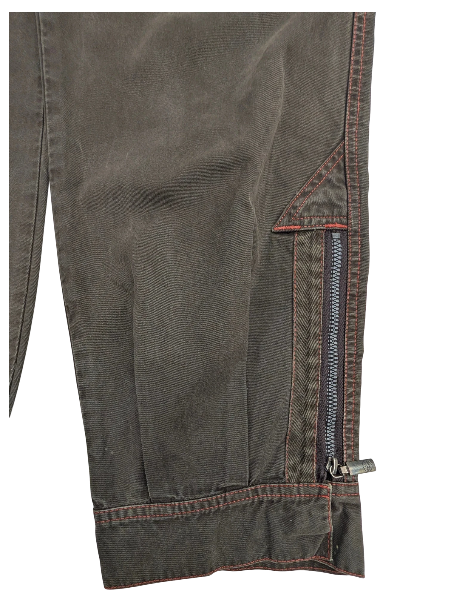 JAKE & IPI Murphy and Nye cargo pants in dark olive green cotton with red contrast stitching and zippered pocket detail.