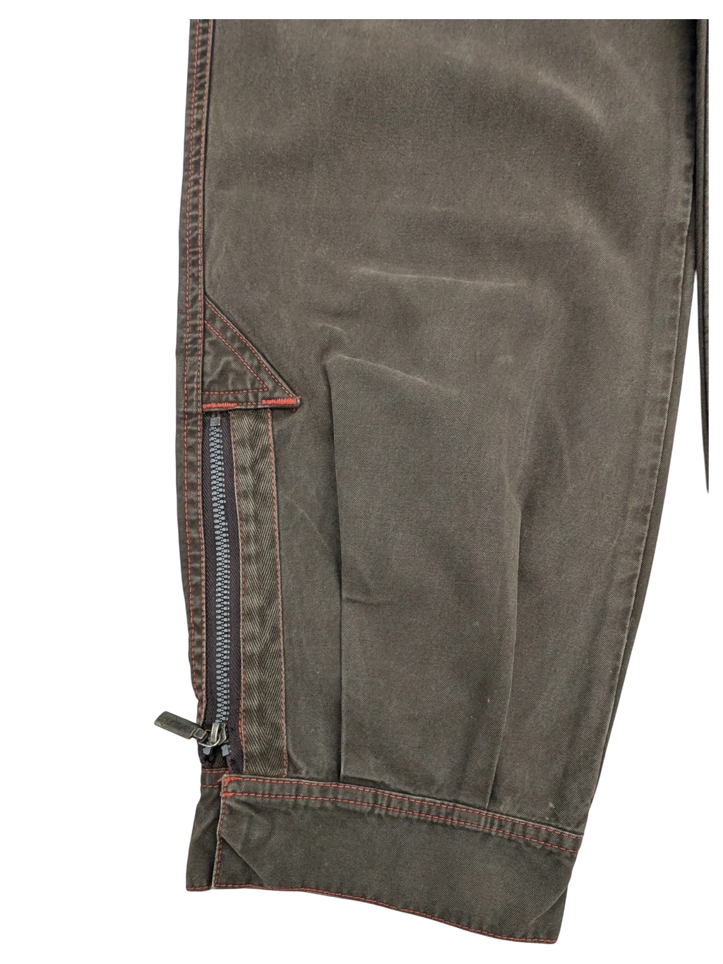 JAKE & IPI Murphy and Nye cargo pants in dark olive green cotton with red stitching and zippered pocket detail.