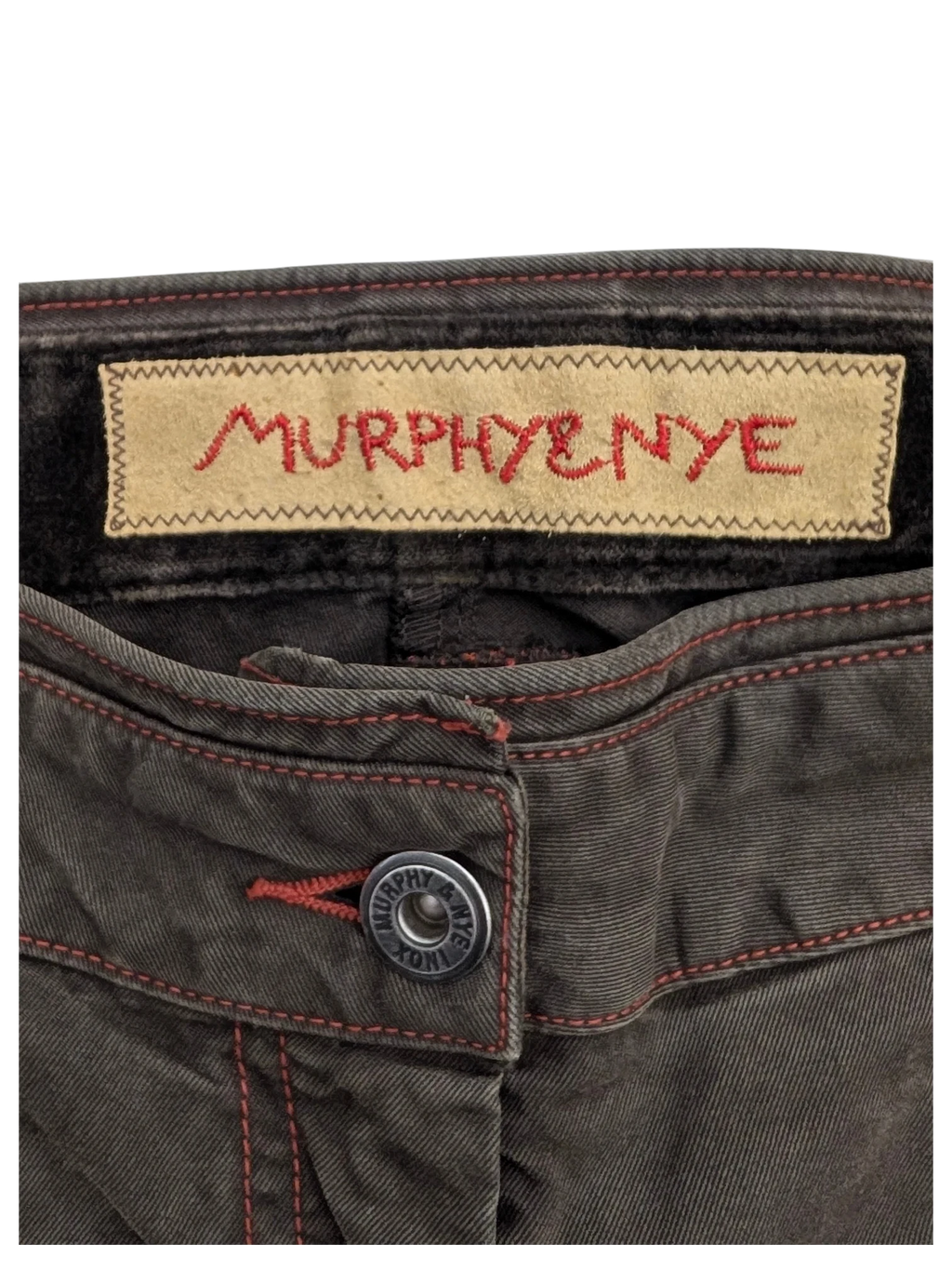JAKE & IPI Murphy & Nye cargo pants in dark olive green with red stitching and branded button.