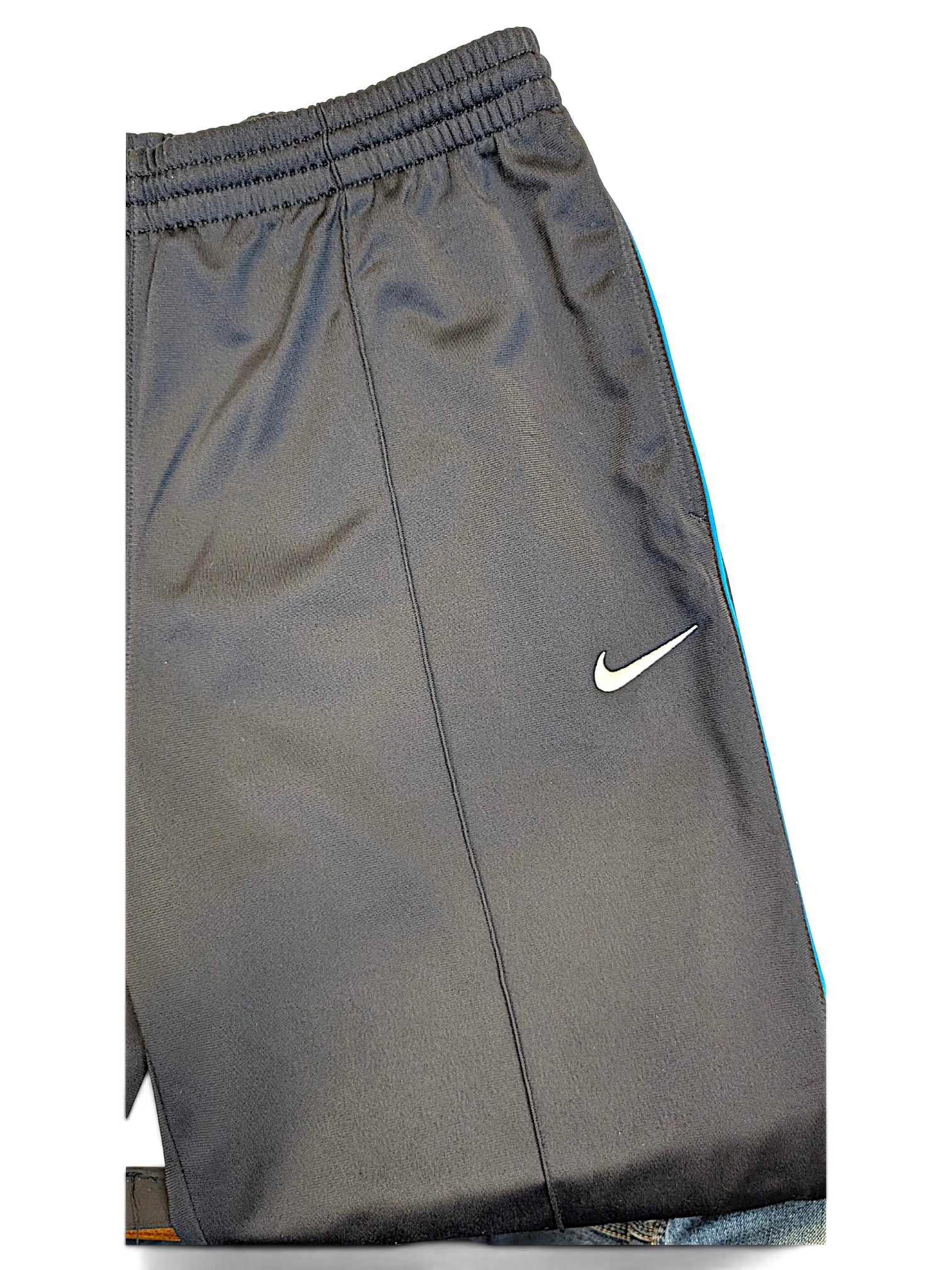 JAKE & IPI Nike grey polyester track pants featuring blue side piping and a white Swoosh logo on the leg