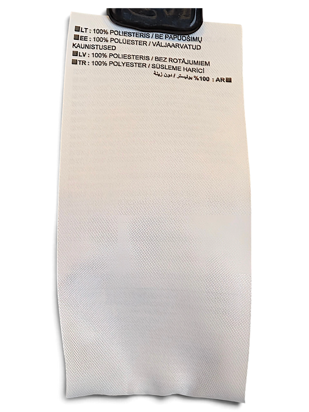 JAKE & IPI Nike track pants care label showing 100% polyester composition in multiple languages