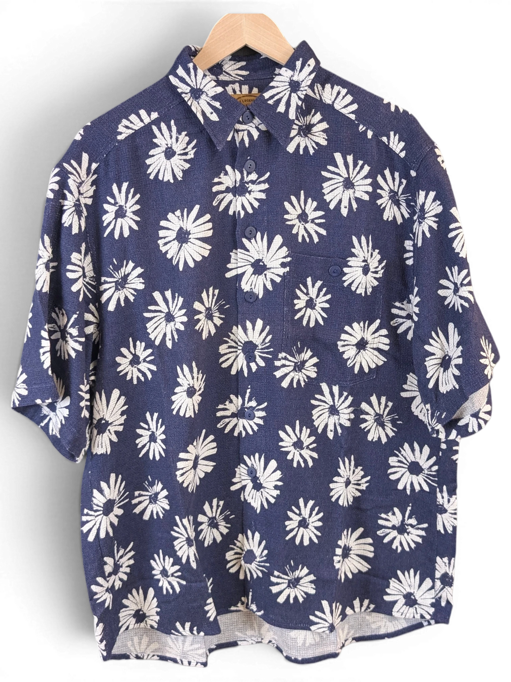 JAKE & IPI Olymp deadstock Hawaiian shirt in navy blue with a white daisy floral print and button-up front.