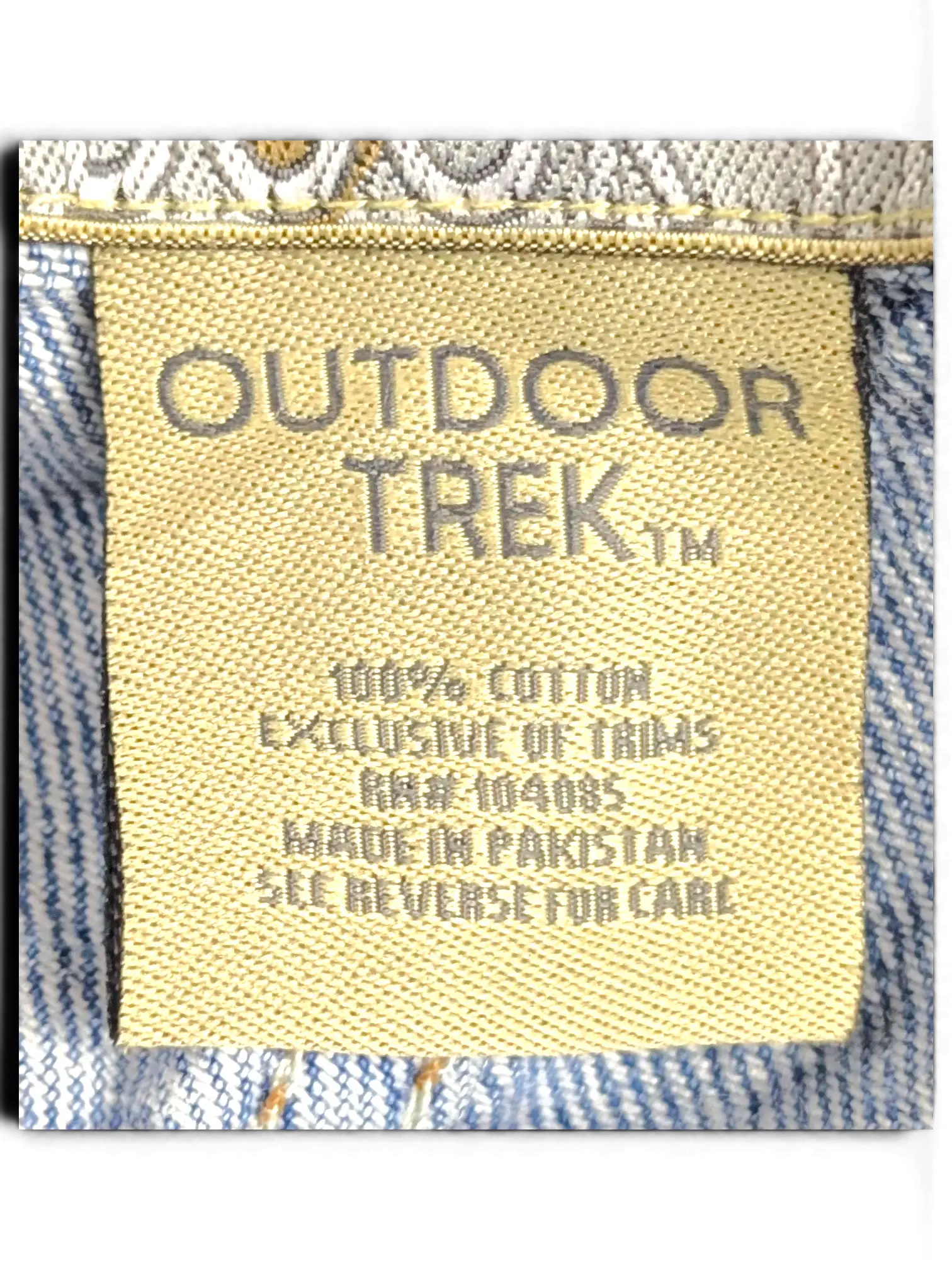 JAKE & IPI Outdoor Trek jeans interior label showing 100% cotton material and mountain print waistband detail