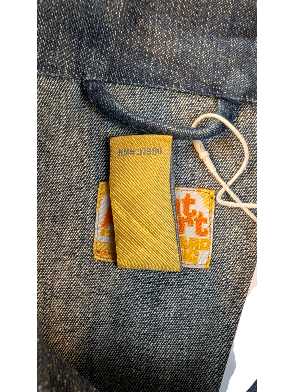 JAKE & IPI Platinum FUBU denim jacket with yellow tags and RN# 37980 detail.