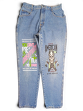 JAKE & IPI blue denim jeans with graphic prints on both legs featuring skull and typography designs.